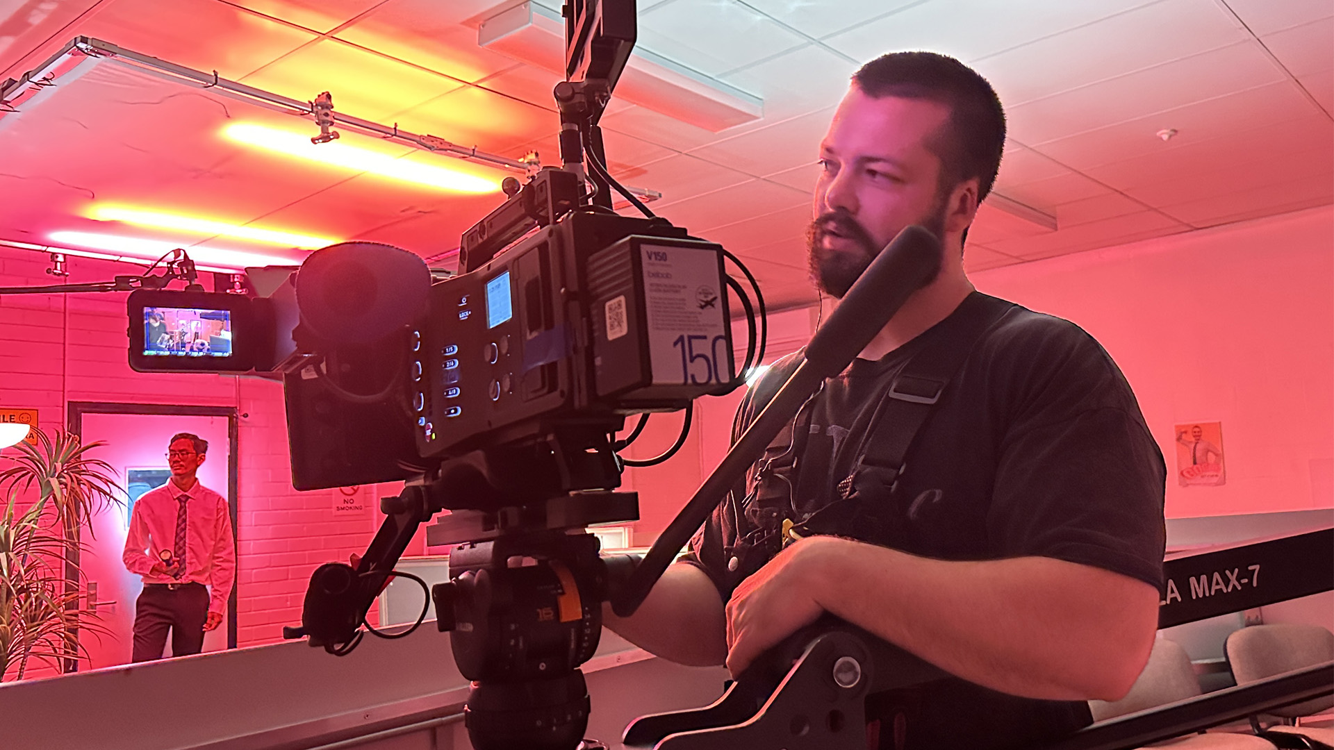 James Kelly operating camera on set